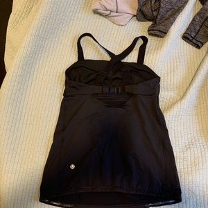 Lululemon black workout tank. Great quality. Built in bra.